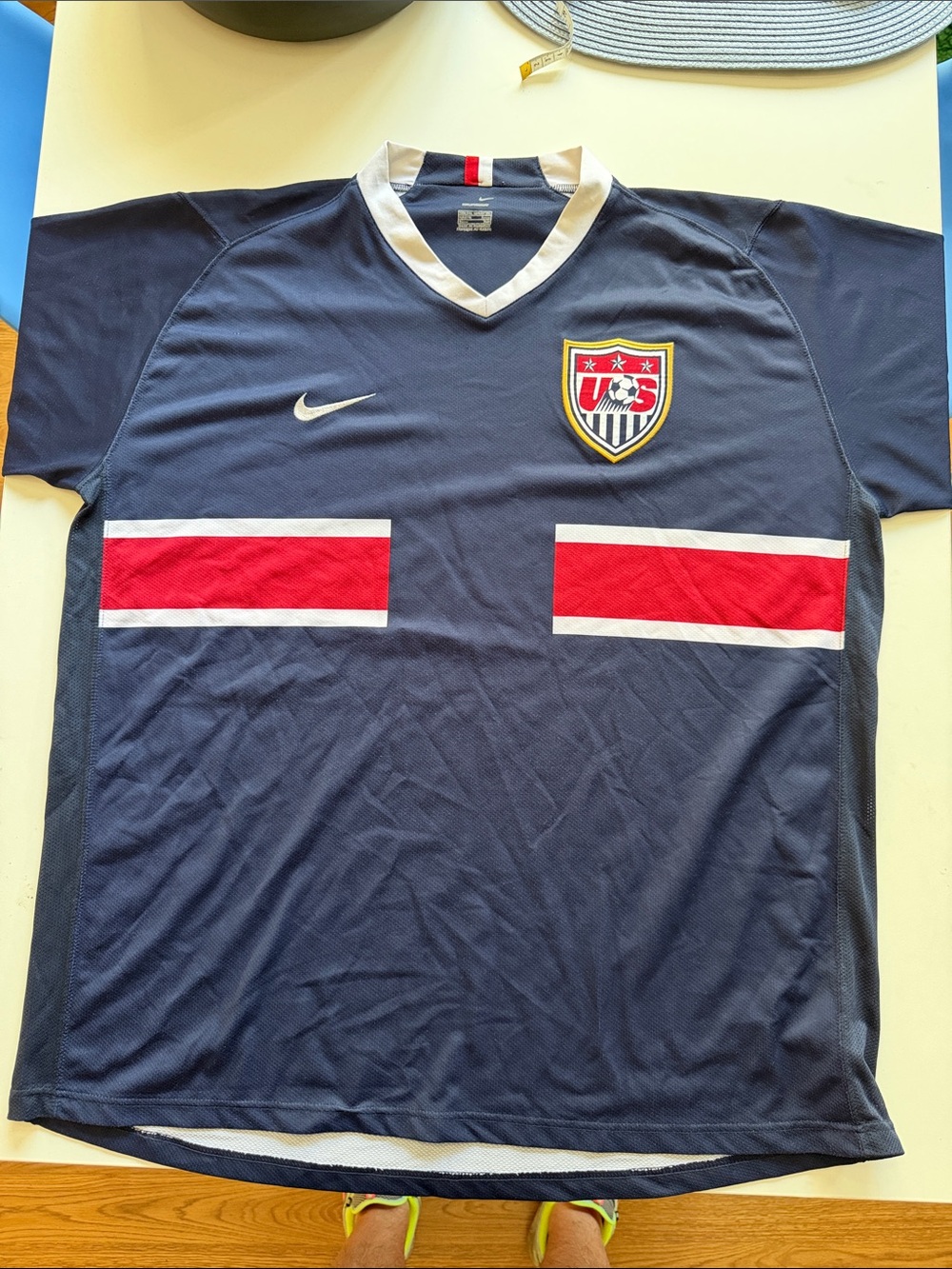 Nike men’s team USA Navy Soccer Jersey with Red and White Chest Stripes